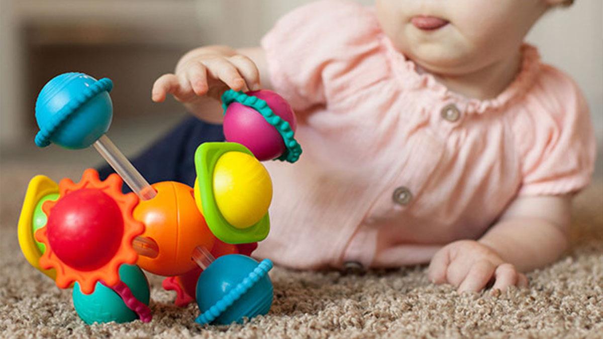 Іграшка-прорізувач Сенсорні кулі Fat Brain Toys Wimzle  (FA136-1)